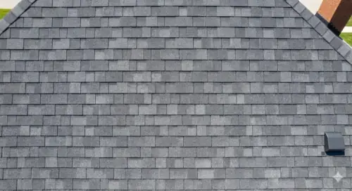 Close-up of grey architectural asphalt shingles on a Thunder Bay home